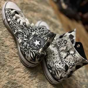 High top Chuck Taylor’s wild cat print